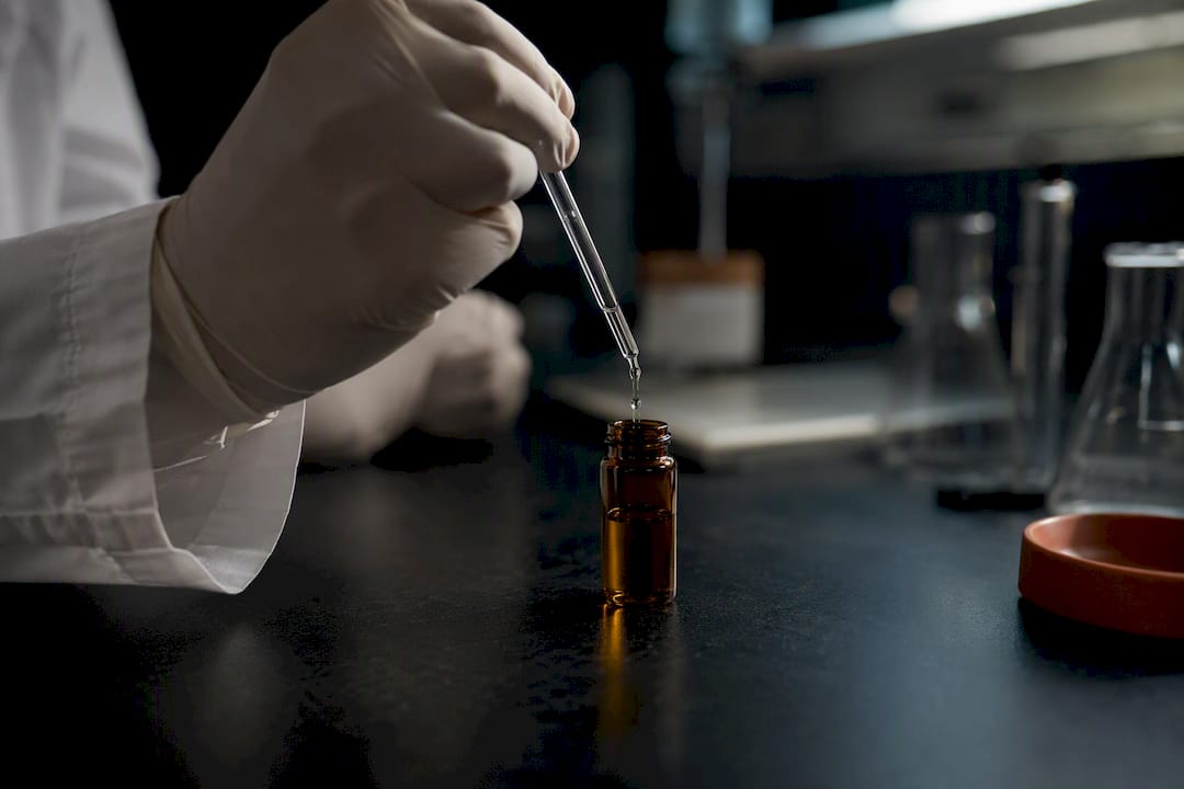 Peptide skincare formulation in dark laboratory