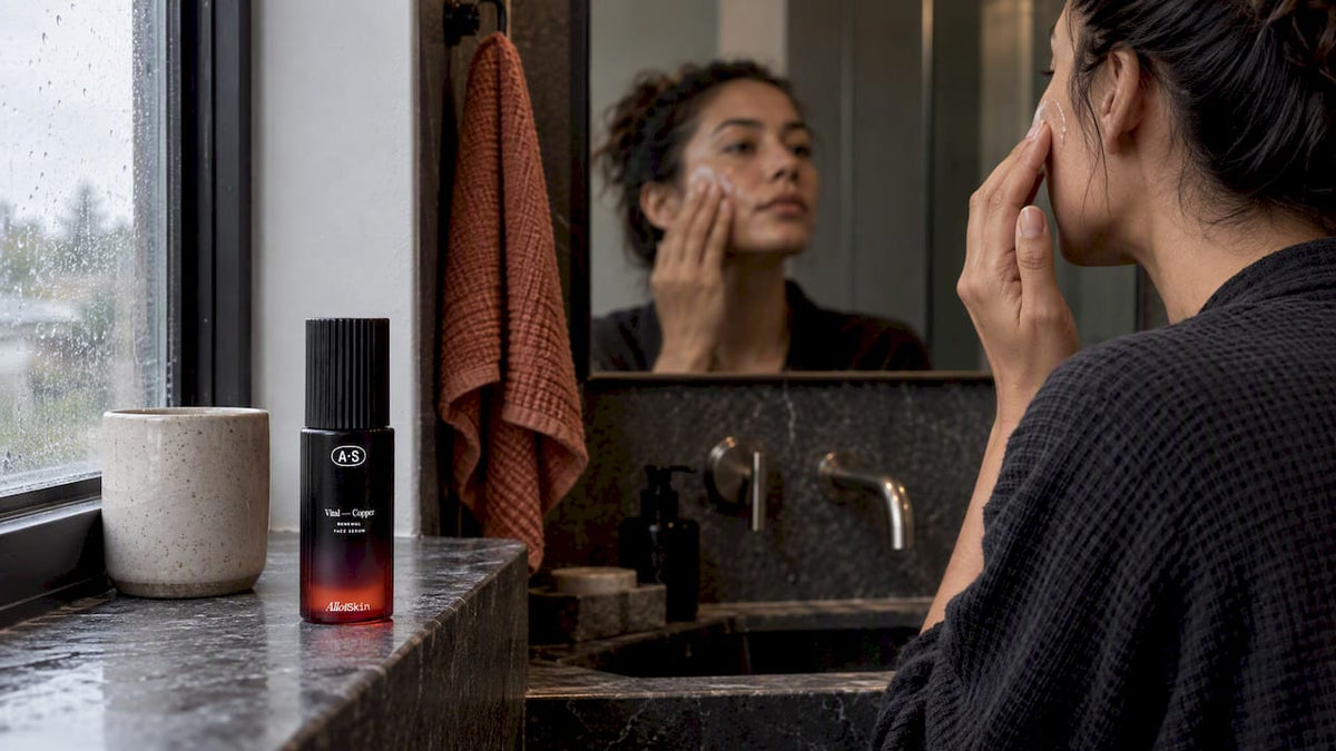 VitalCopper serum beside bathroom mirror