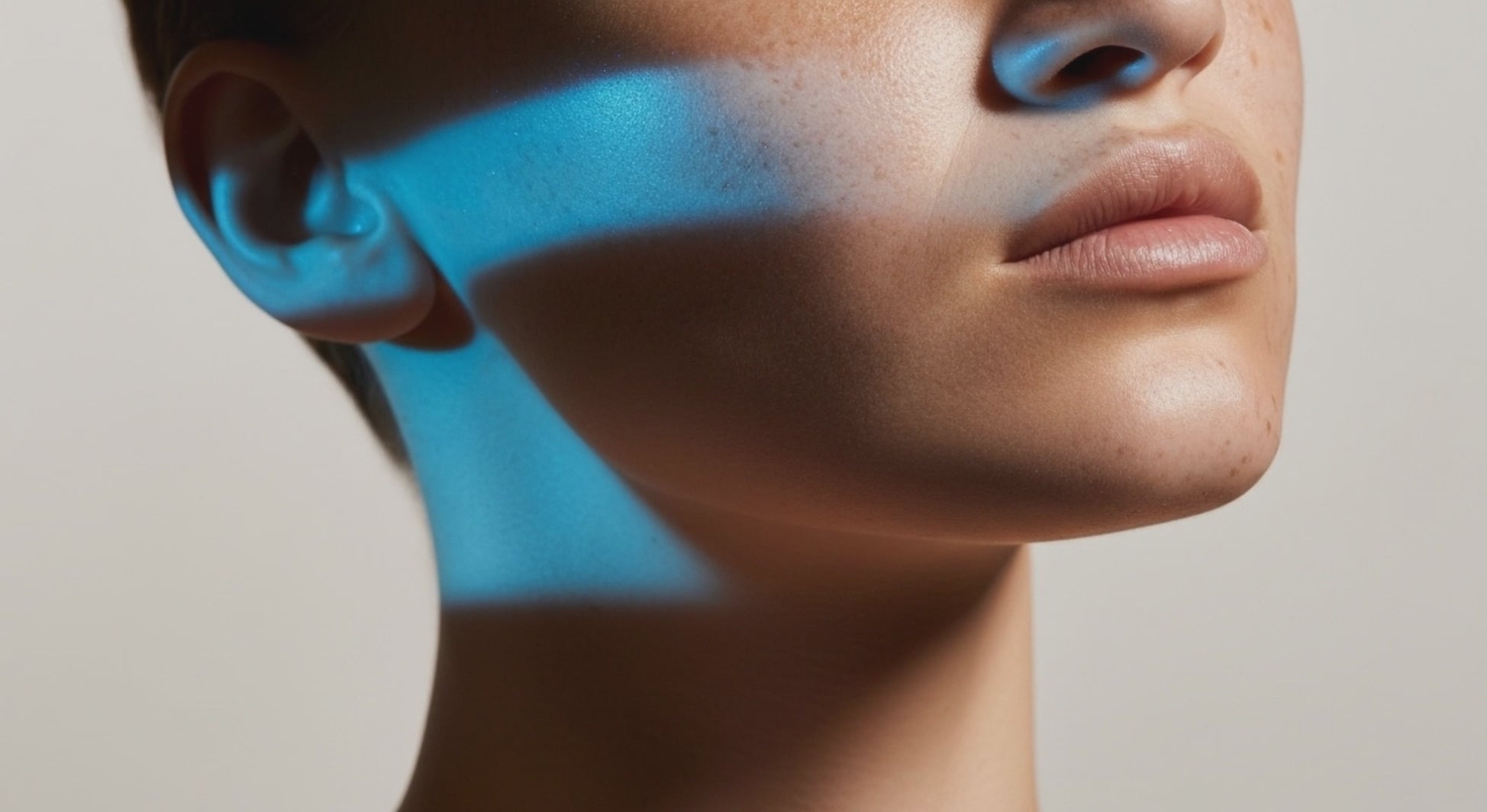 A Woman's face with blue light